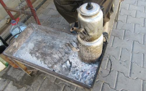 Mangal kömürü ateşinde çay